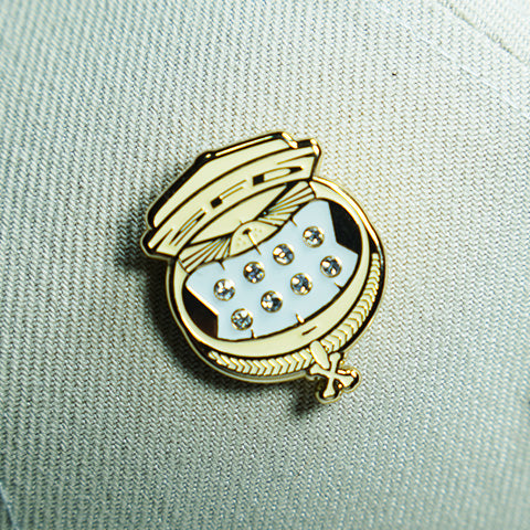 PIN BONES DORADO