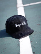 CAP NEW ERA X SUPREME ALL OVER BLACK