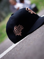 SYNA X NEW ERA 9FIFTY SNAPBACK CAP